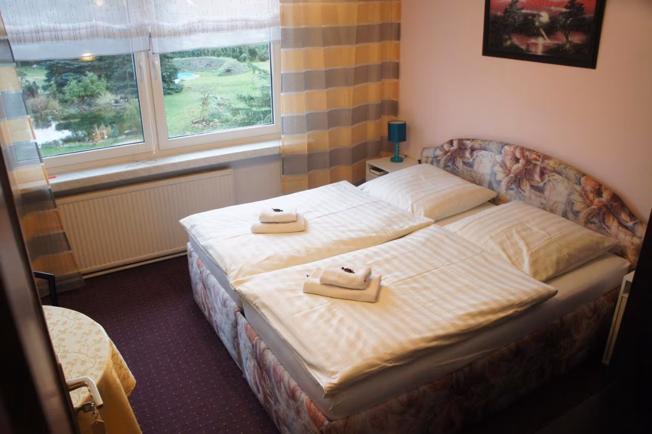 Doppelzimmer mit Gartenblick